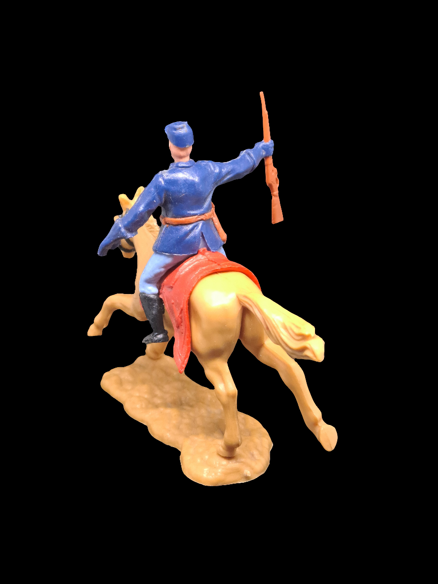 Soldier with cap and rifle on horseback.