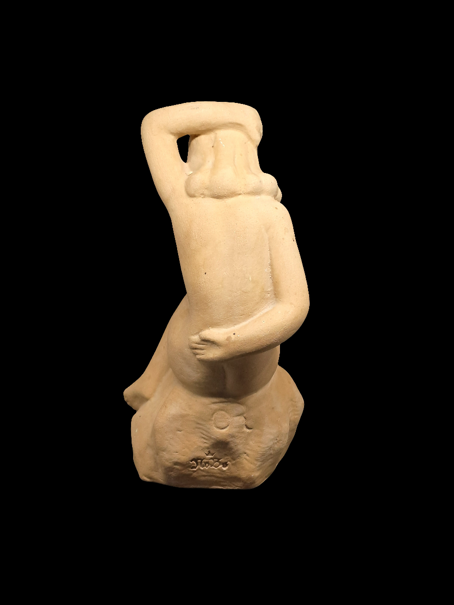 Nude Woman on Stone. Ove Rasmussen.