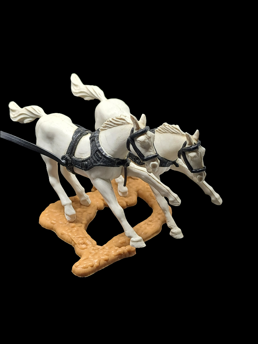 Prairie wagon w/2 horses.