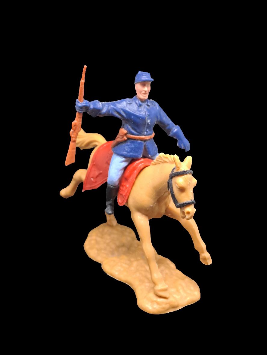 Soldier with cap and rifle on horseback.