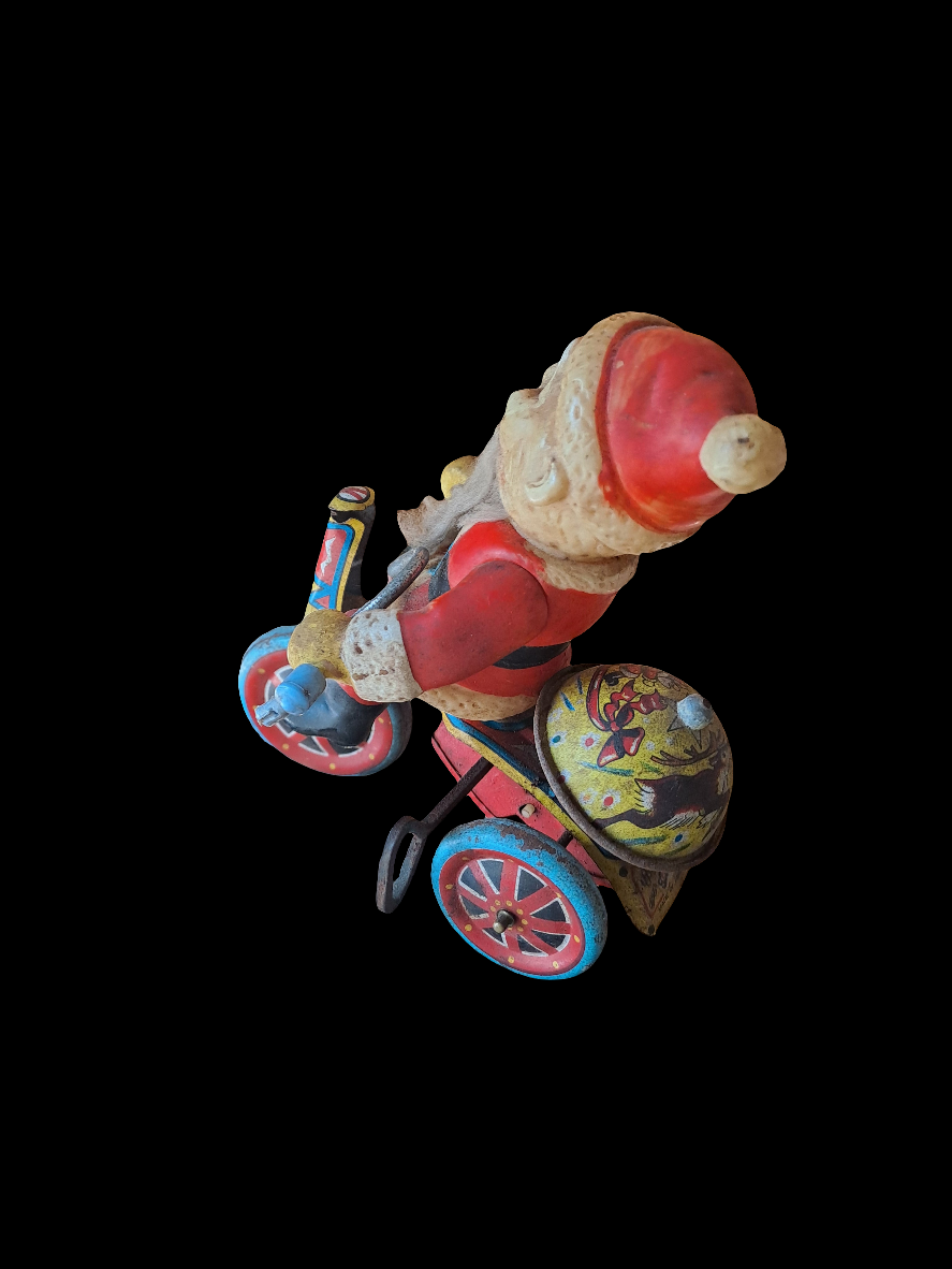 Santa on Tricycle Tin Toy