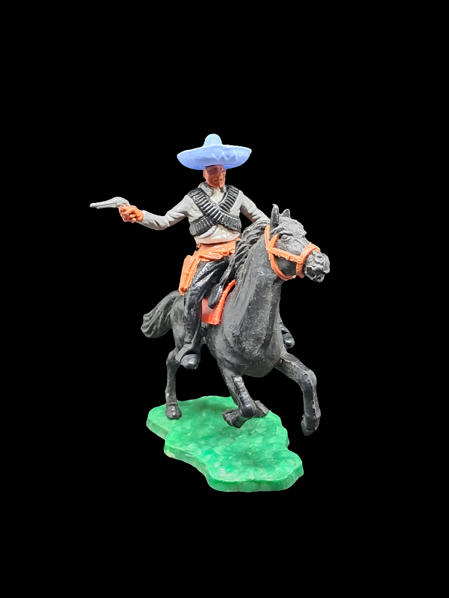 Mexicans on horseback.