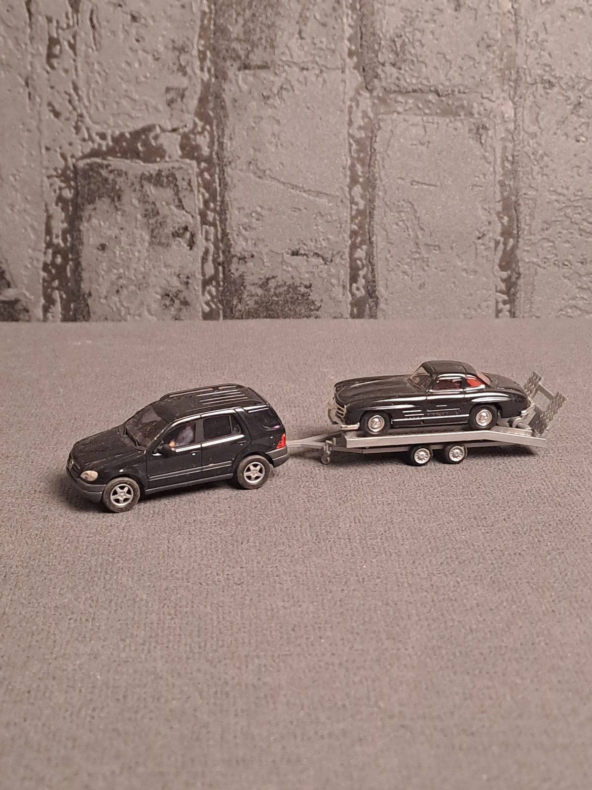 Busch Mercedes ML Class with Mercedes 300 on Trailer