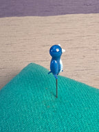 Needle case bird
