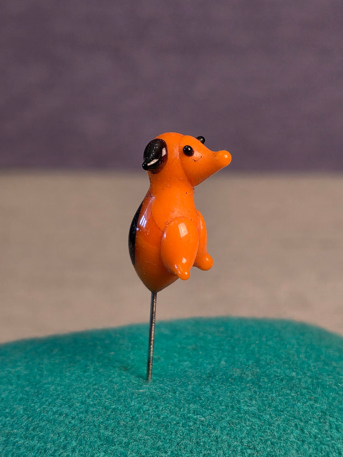 Sewing needle dog