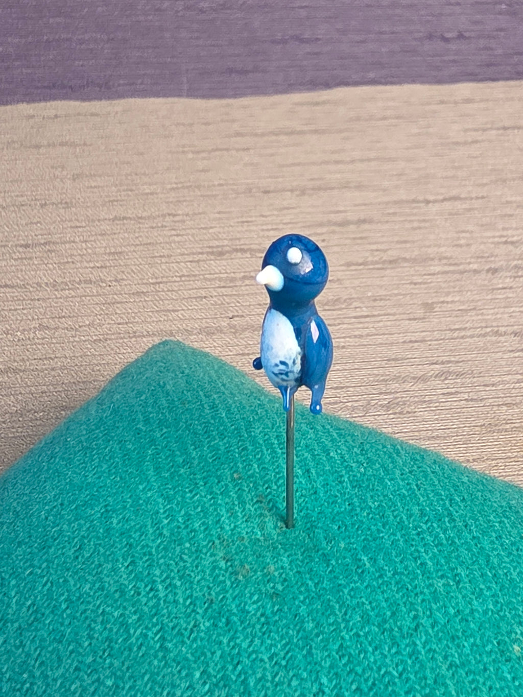 Needle case bird