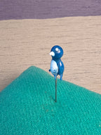 Needle case bird