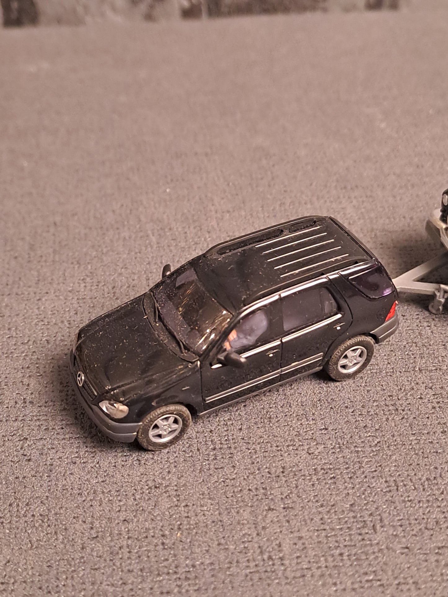 Busch Mercedes ML Class with Mercedes 300 on Trailer