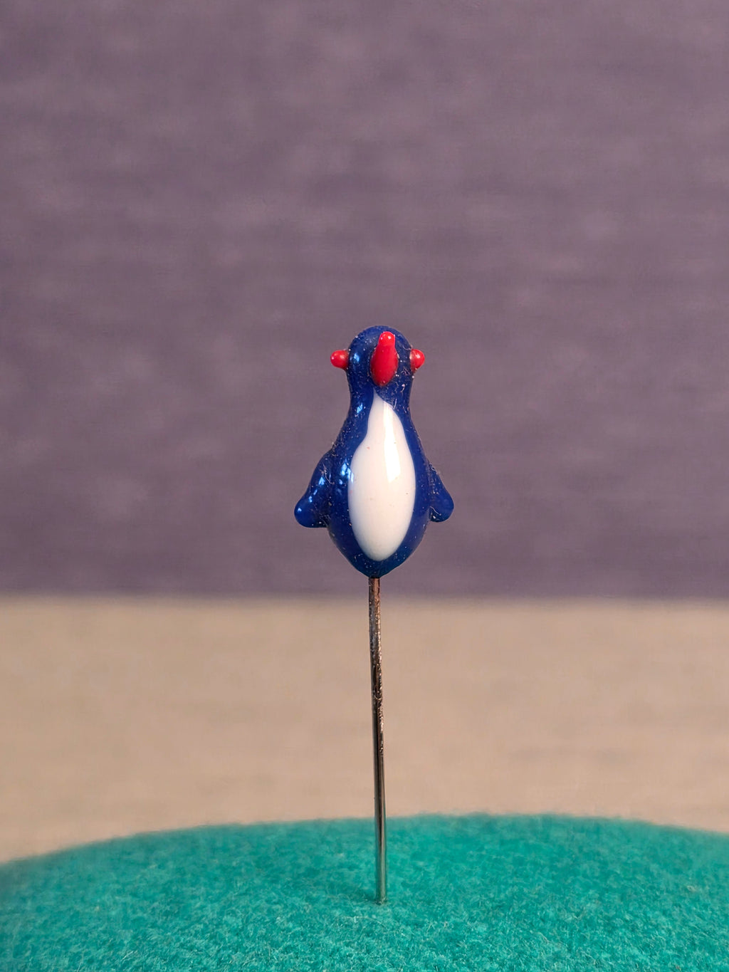 Needle. Bird.