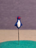 Needle. Bird.