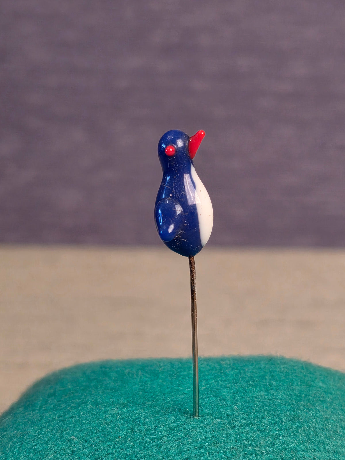 Needle. Bird.